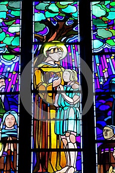 Religious picture on stained glass in the church