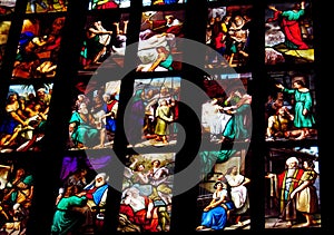 Religious picture on stained glass in the church