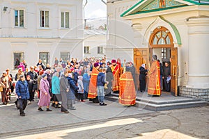 Religious procession near the church In the name of the apostles Peter and Paul. Spring sunny day