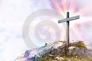 Religious representation with cross on top of a hill