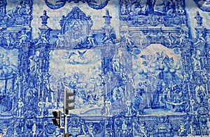 Religious scene in Portuguese blue and white tiles. Capela das Almas in Porto, Portugal