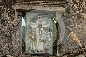 Religious scene on stained glass window in abandoned church on Yim Tin Tsai, an island in Sai Kung, Hong Kong