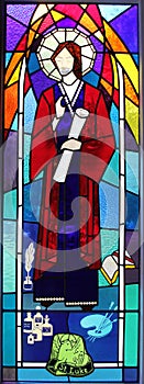 Religious stained glass window with Saint Luke, Queensland, Australia photo