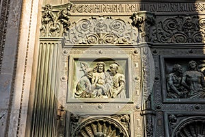 Religious statue on the bronze door of Saint Isaacâ€™s Cathedral or Isaakievskiy Sobor, a monuments of Russian architecture,near