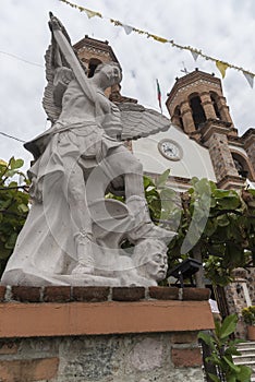 Religious statue outside the Parroquia de San Miguel Arcangel Pitillal Puerto Vallarta photo