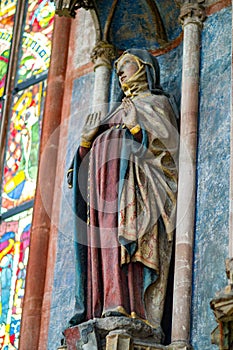 Religious stone carving of Holy Mary in the interior of St. Lorenz St. Lawrence; a medieval church in the city of Nuremberg in