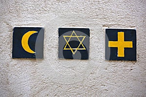 Religious symbols: islamic crescent, jewish David's star, christian cross