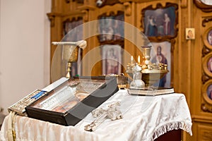 Religious utensils - bible, cross, prayer book. Details in orthodox christian church