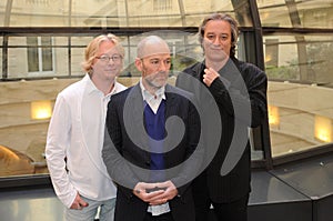 Rem band during the photosession ,Mike Mills, Michael Stipe, Peter Buck