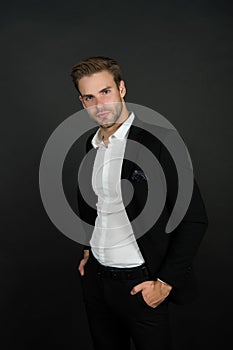 Remaining conservative in style. Stylish businessman dark background. Modern man in office style. Professional wardrobe