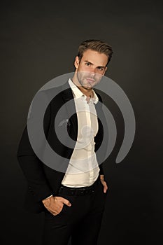 Remaining conservative in style. Stylish businessman dark background. Modern man in office style. Professional wardrobe