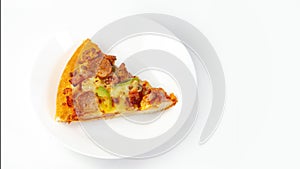 The remaining pizza is in the plate.Close-up pizza is in dish.