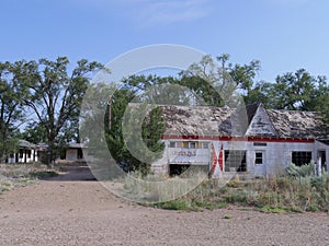 Abandoned structures at the Glenrio ghost town, one of America`s ghost towns at Route 66 on the border of New Mexico and Texas photo