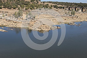 Remains of the Ajuda bridge over The Guadiana River photo