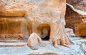 Remains of ancient statues in the Siq at Petra