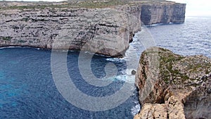The remains of Azure Window at Dwerja Bay at the coast of Gozo Malta