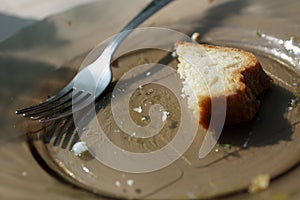 Remains of bread on plate