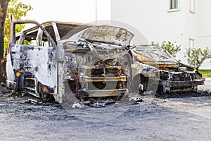 Remains of a car and van destroyed by fire accident