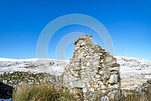 The remains of the Derryveagh evictions - In April 1861 landlord John George Adair evicts over 250 tenants from Donegal photo