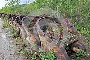 The remains of a historical delelict gold dredge on Bonanza creek near Dawson City, Canada
