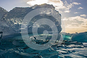 remains of an iceberg at the black pebble beach, coast of iceland