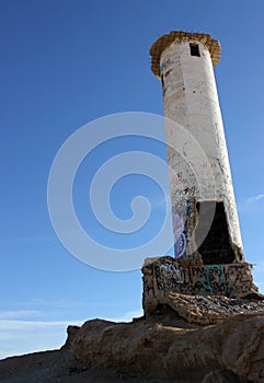 Crumbling light house, shore of Sea of Cortez, El Golfo de Santa Clara, Mexico photo