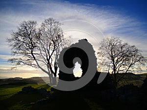 Remains of a medieval wall at sunset