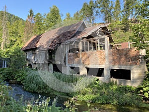 Remains of an old sawmill on the small dam of ÄŒogrljevo Lake in the mountain hamlet of TiÄ‡i - Gorski kotar, Croatia