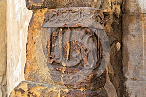 Remains of old stone exteriorwall with engraved calligraphy, adjacent to the Mausoleum of al-Salih Nagm Ad-Din Ayyub, Cairo, Egypt photo