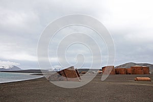 Remains of an old whaling station at Whaler`s Bay, Deception Island, Antarctica.