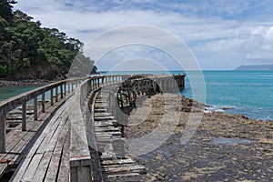 Remains of old wharf or jetty stretching out from land