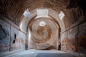 Remains of the public baths in Pompeii . Italy