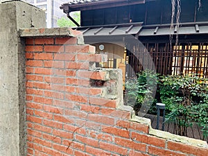 The remains of the red brick wall of the Zen Japanese-style architectural courtyard (Taipei City Penal Service Building)