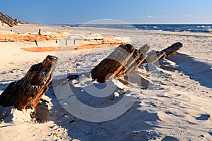 The remains of a shipwreck on a beach