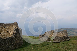 Remains of the stone wall designs believed to be residences or dwellings at the ancient city or archaeological site Kuelap , Peru