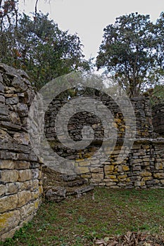 Remains of the stone walls believed to be residences or dwellings at the ancient city or archaeological site Kuelap , Peru.