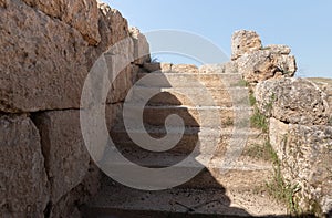 Remains  of well-preserved stone steps in the ruins of the outer part of the palace of King Herod - Herodion,in the Judean Desert