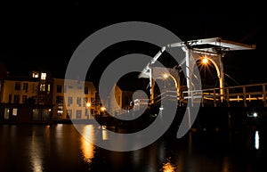 Rembrandt bridge over Rijn in Leiden at night photo