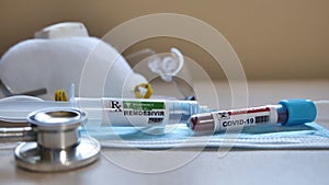 Remdesivir antiviral liquid and covid 19 positive test coronavirus photo