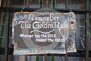 Remember the Golden Rule whoever has the gold makes the rules sign photo