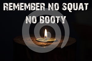 Remember no squat no booty - white candle with dark background -