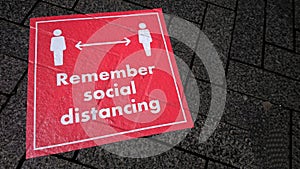 Remember Social Distancing Red Road Sign