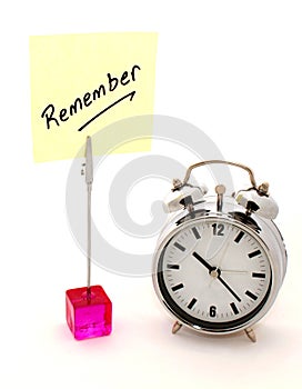 Remember, yellow note and alarm clock