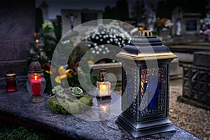 Rememberance candle lanterns in the cemetery on all saints day