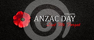 The remembrance poppy - poppy appeal. Poppy flower on black textured background. Decorative flower for Anzac Day.