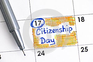 Reminder Citizenship Day in calendar with pen.