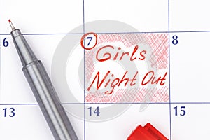 Reminder Girls Night Out in calendar with pen