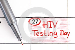 Reminder HIV Testing Day in calendar with pen