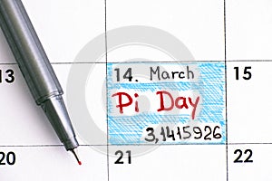 Reminder Pi Day in calendar with red pen.