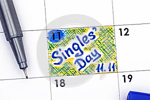 Reminder Singles Day 11.11 in calendar with blue pen photo